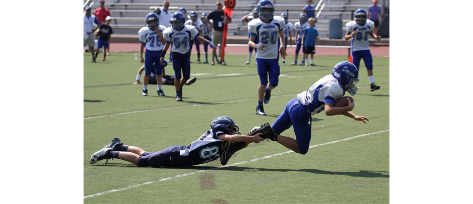 Wilton Tackle Football In Action